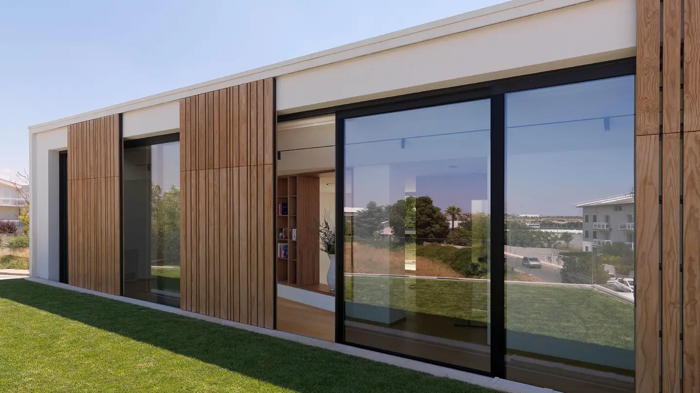 Large Schüco sliding glass doors integrated between timber – aluminum sliding doors featured on Schüco Sliding Glass Doors USA | ASE & Panorama