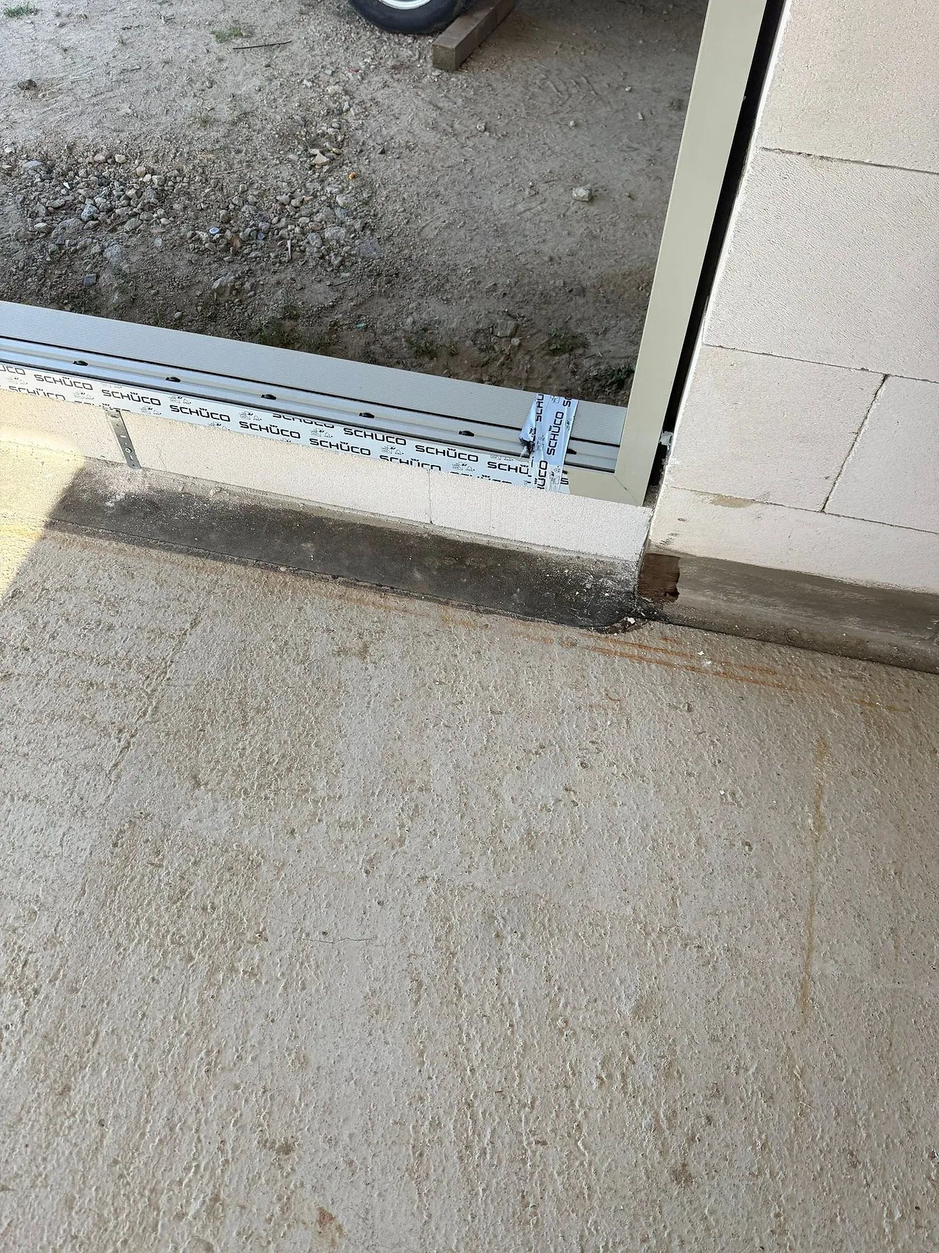 Aluminum sliding door floor threshold detail in a building shell – aluminum project reference featured on Projects & References | Custom Aluminum Windows